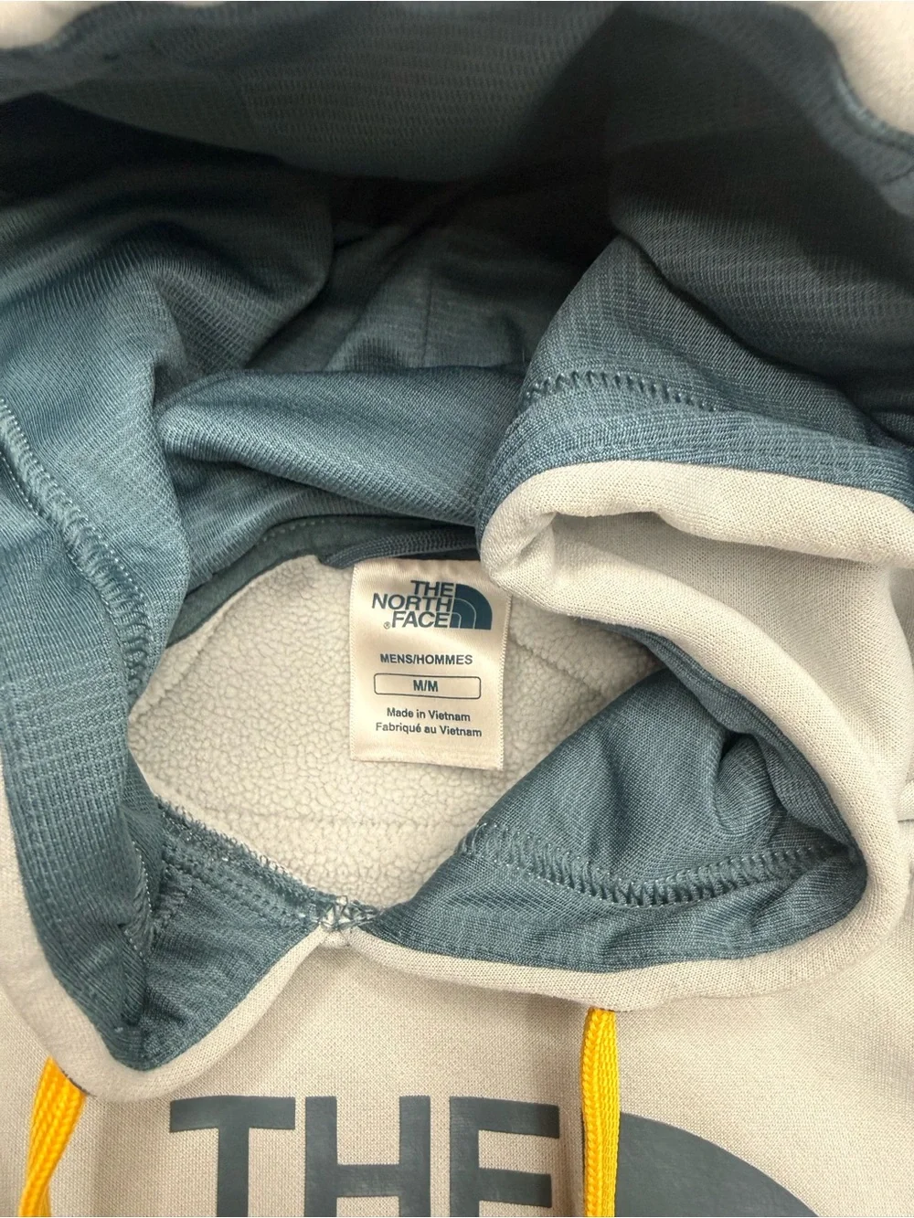 The North Face Men's Light Gray Crewneck Hoodie with Yellow Drawcords
